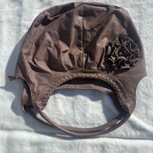 Chic Brown Leather Hat with Floral Accent